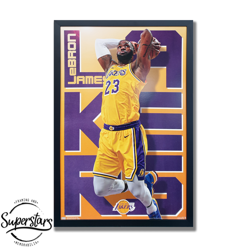 LA Laker's champion LeBron James poster. Centre features Lebron about to dunk and the letters to spell out Lakers are behind him. Custom framed in a black timber frame in perth