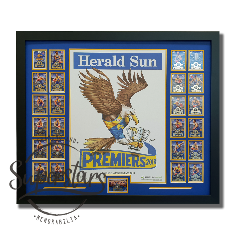 This large frame has a poster in the middle. The poster is the Herald Sun cover for West Coast Eagles AFL 2018 premiership. This poster is surrounded by the playing cards of each of the team members. It has been framed with a blue border and black frame.