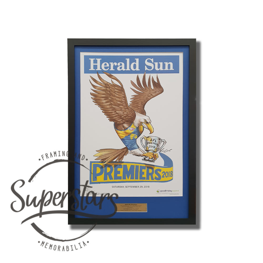 A poster celebrating West Coast Eagles 2018 AFL premiership. It has been framed with a gold plaque, blue border and black timber frame